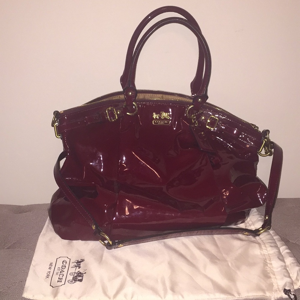 Deep red patent coach purse
